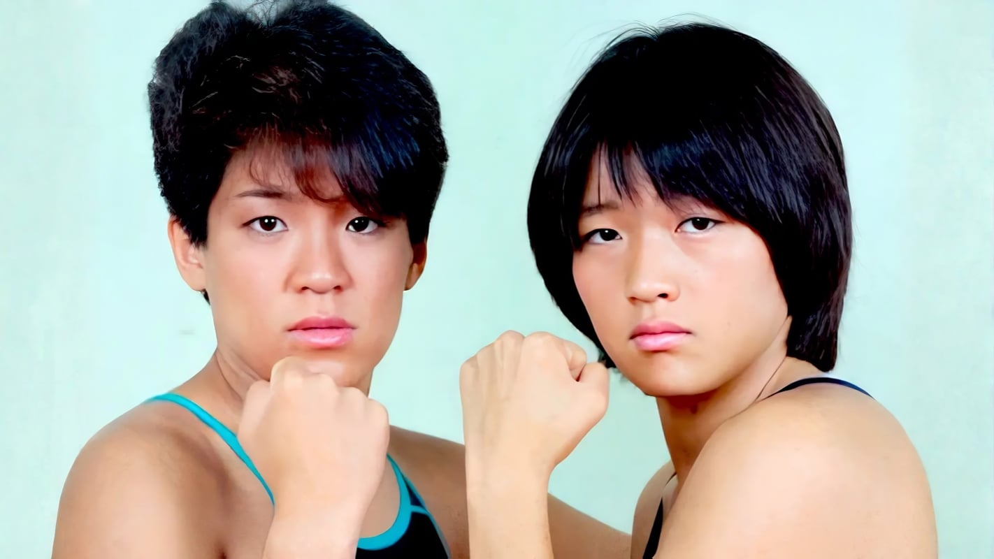 The Crush Gals, Lioness Asuka and Chigusa Nagayo, whose feud with Dump Matsumoto drew over 20 percent television ratings and defined joshi wrestling’s golden era in Japan. 