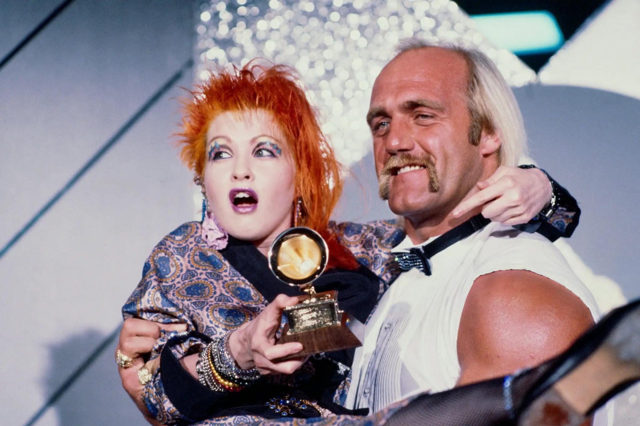 Hulk Hogan joins Cyndi Lauper at the 27th Grammy Awards on February 26, 1985, where Lauper took home Best New Artist following her breakthrough album She's So Unusual.