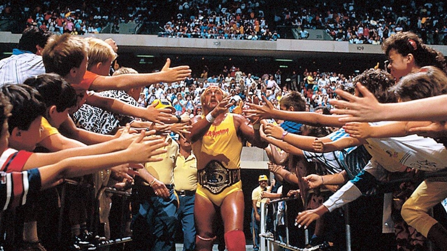 Hulk Hogan as WWF Champion making his way through a sea of fans on his way to the ring.