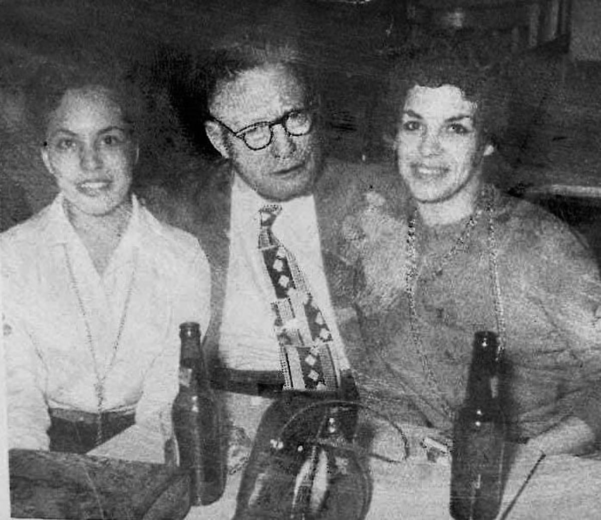 Black woman wrestling pioneer Pearl Bates (real name Mary Reynolds) with 1950s women’s wrestling promoter Billy Wolfe and wrestler Lola Loray. 
