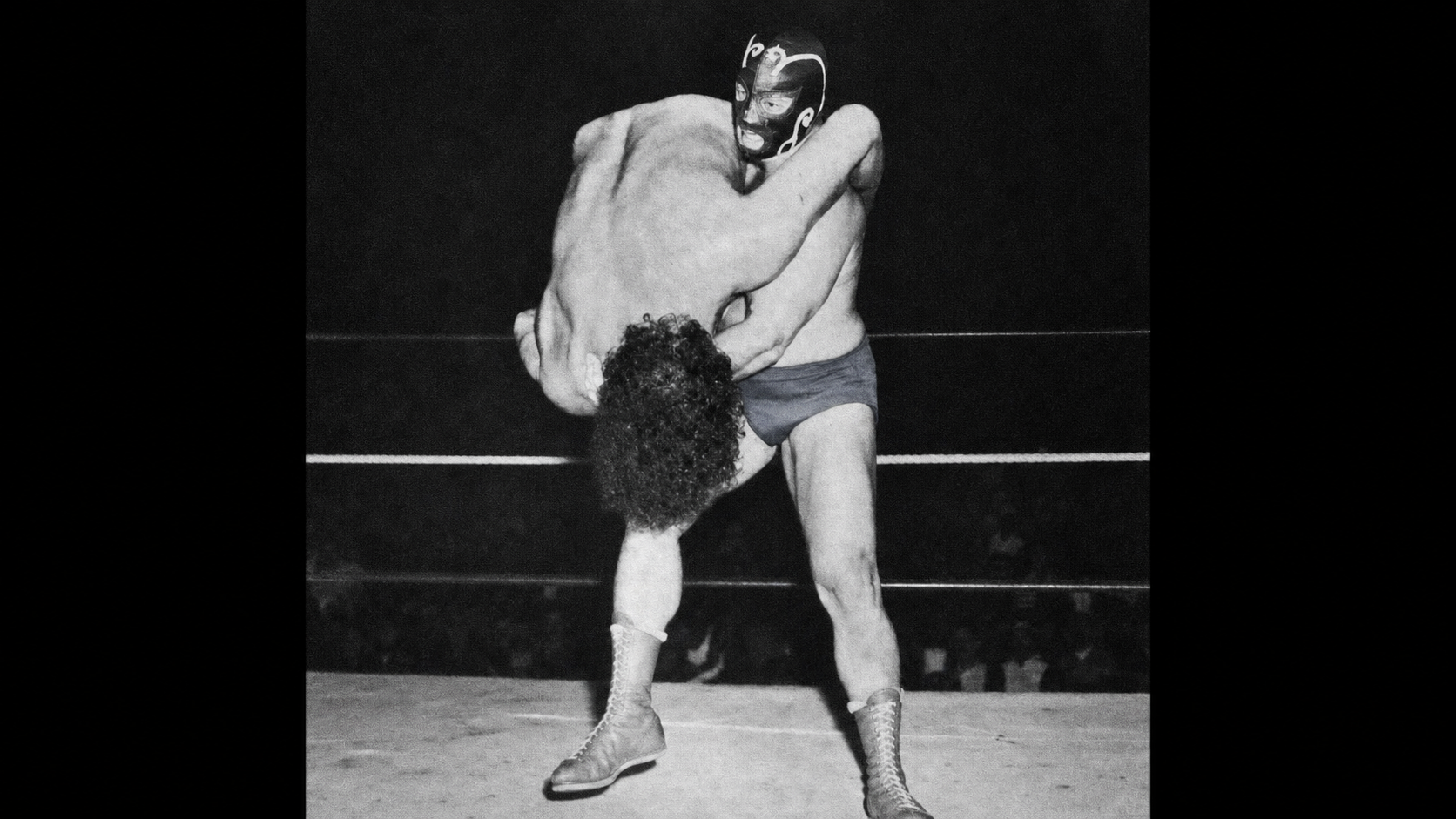 Doug "The Professional" Gilbert bodyslams Andre the Giant, then known as Jean Ferre, in Montreal in 1972, during Andre's first North American run for Grand Prix Wrestling.