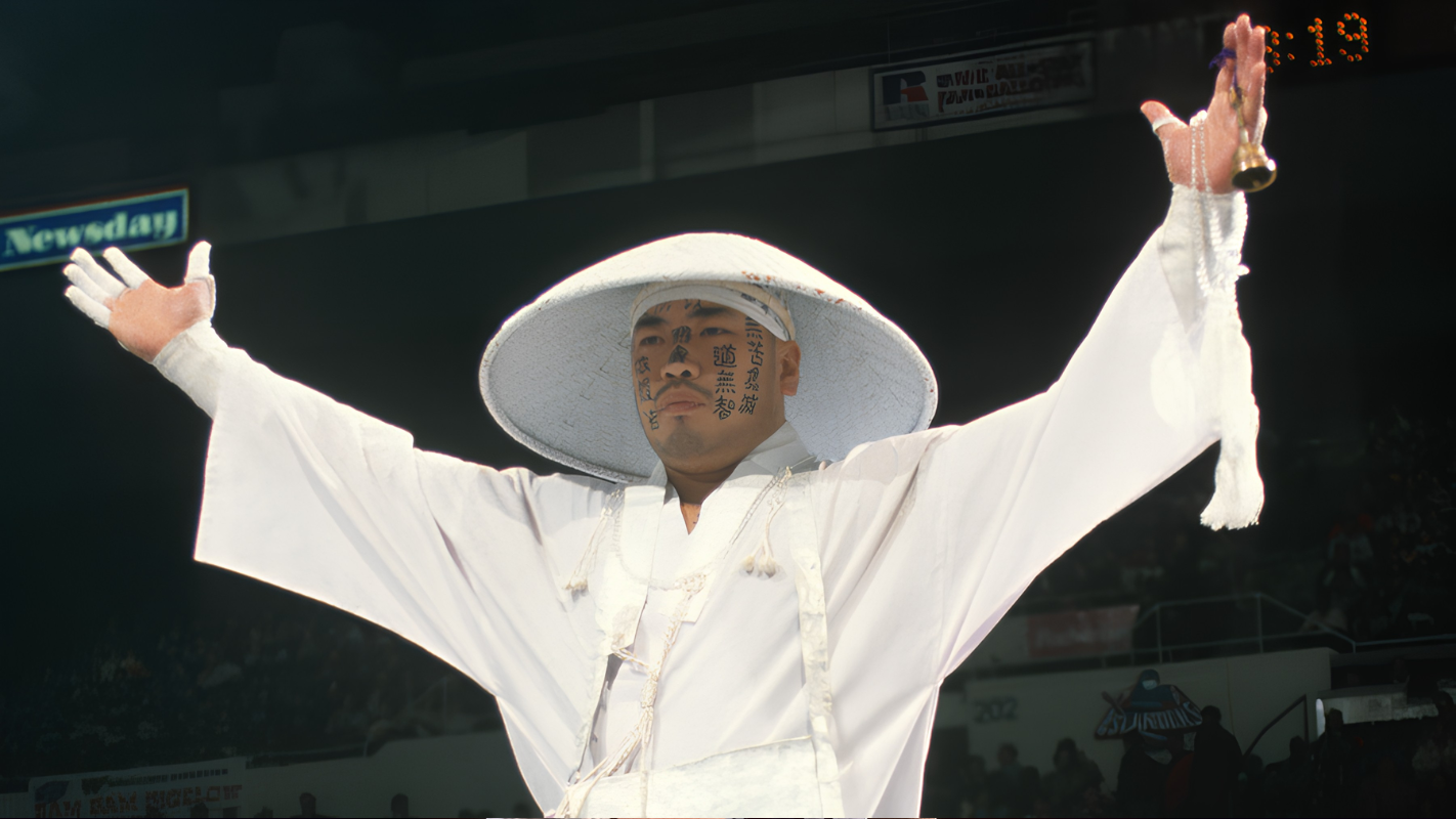 15 1990s WWF Heels That Deserve More Love! Jinsei Shinzaki as Hakushi, flanked by manager Shinja, during his 1995 to 1996 WWF run