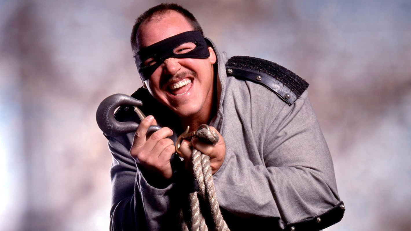 15 1990s WWF Heels That Deserve More Love! Barry Darsow as Repo Man taunting the crowd during his 1991 to 1993 WWF run as the sneaky repossession-obsessed villain.