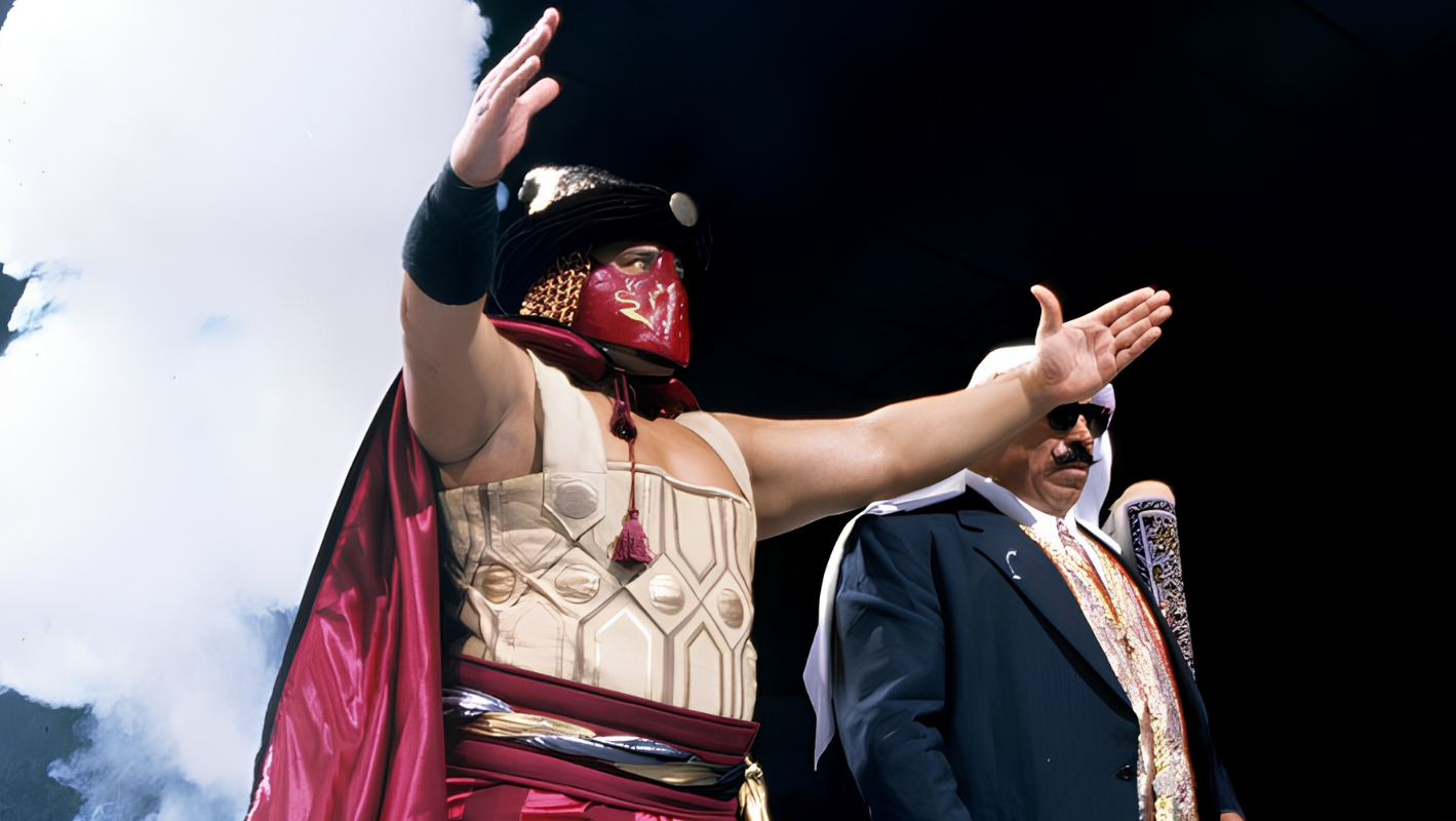 15 1990s WWF Heels That Deserve More Love! Solofa Fatu as The Sultan, flanked by manager The Iron Sheik, during his 1996 to 1997 WWF run