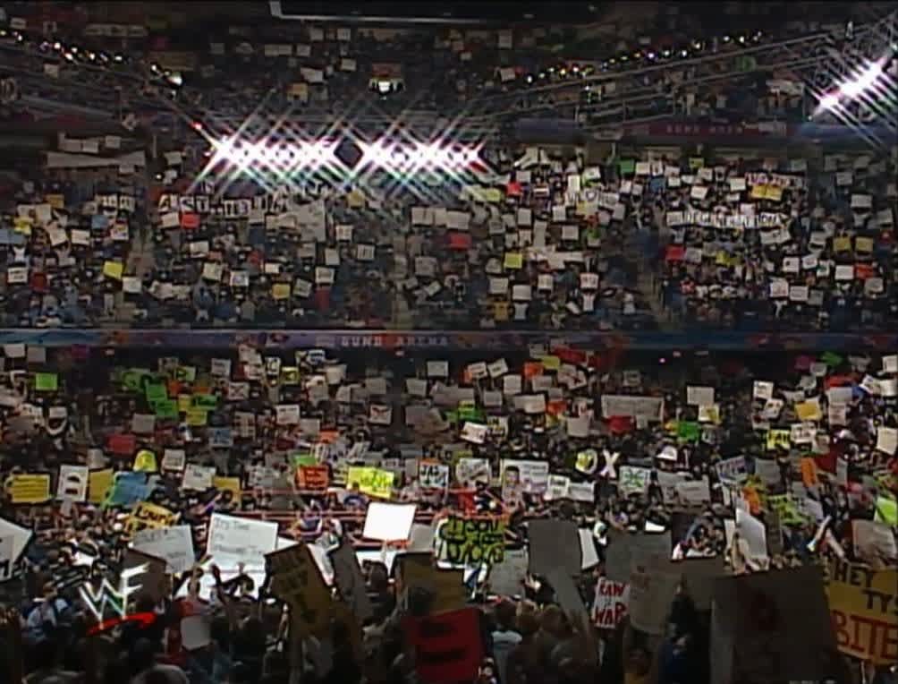 A packed WWF Raw arena during the Attitude Era, the era Vince Russo helped architect with bold, boundary-pushing television that brought millions of new viewers to the product. 
