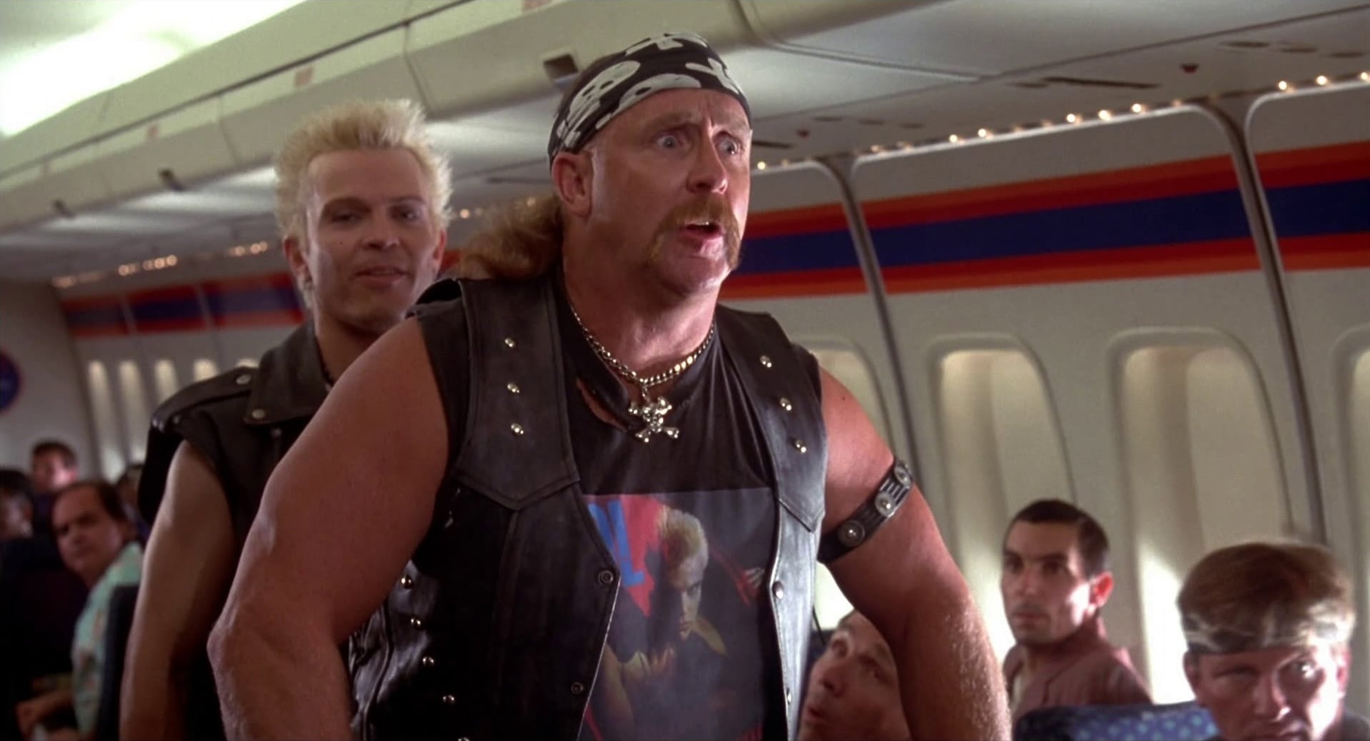 Al Burke: The Pro Wrestler Adam Sandler Handpicked Al Burke and Billy Idol appear together in a promotional still from the 1998 film The Wedding Singer.