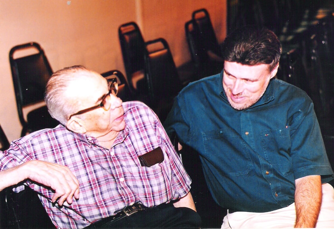 Mike Mooneyham sits beside longtime Charleston wrestling promoter Henry Marcus, a mentor who shaped his early career covering the Mid-Atlantic wrestling territory.