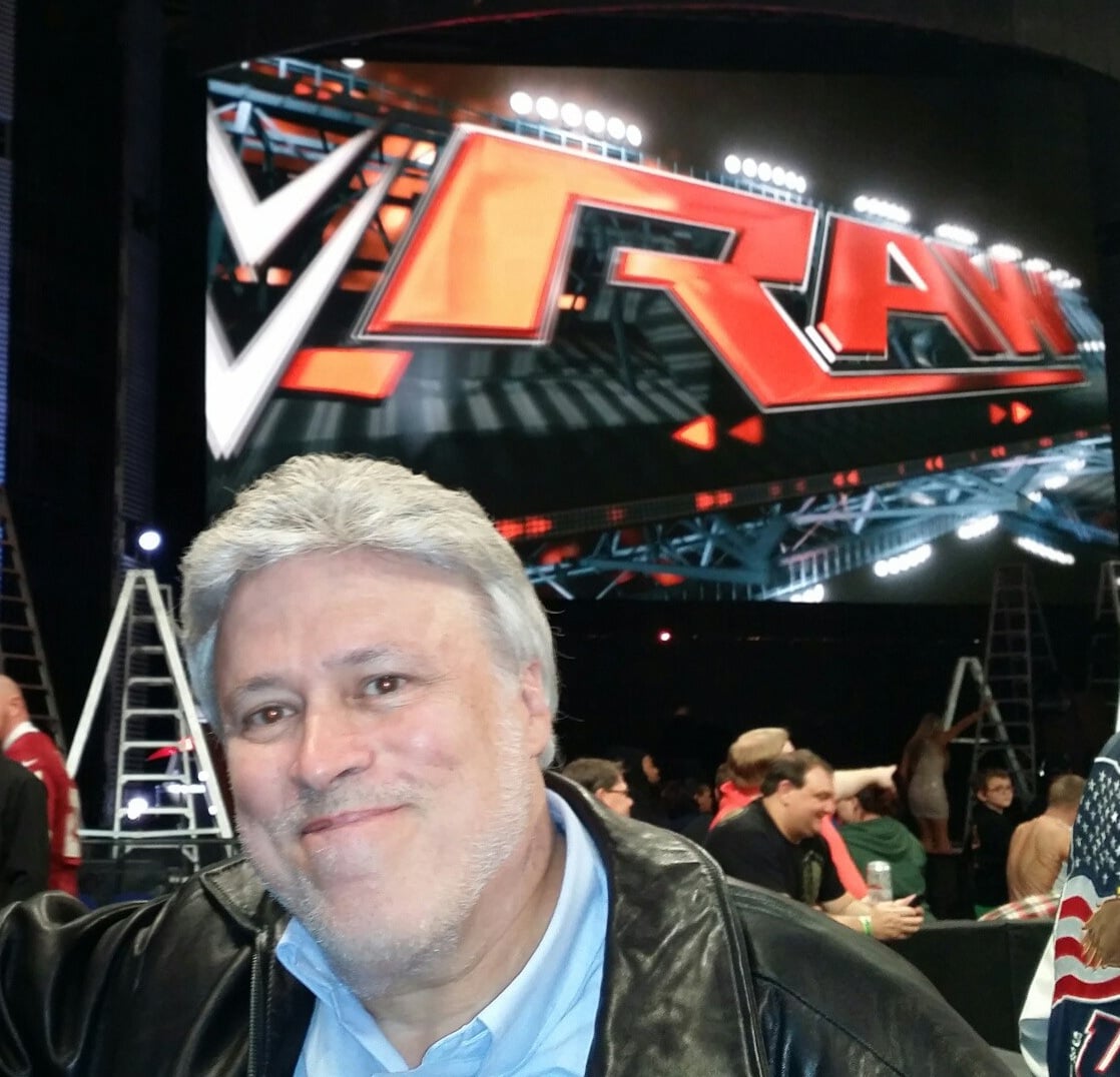 Mike Mooneyham backstage at a WWE Monday Night Raw event, where an unexpected encounter with Vince McMahon occurred just months before the release of Sex, Lies and Headlocks.