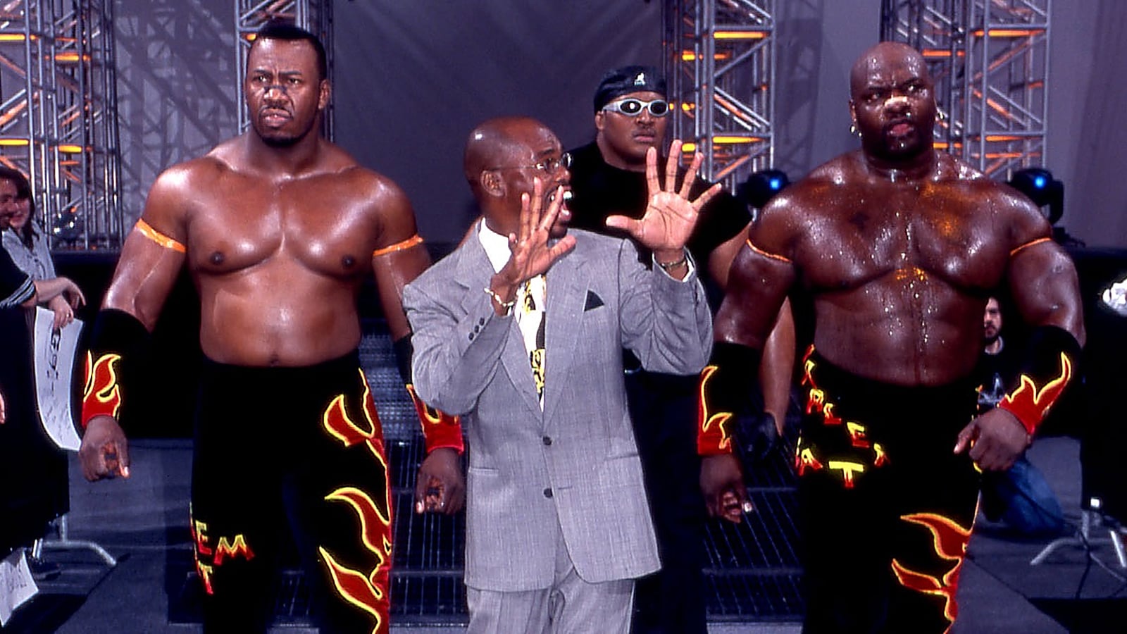 Ahmed Johnson: The Kick That Ended a WWF Star's Rise After his WWF run, Ahmed Johnson resurfaced in WCW in 2000 as Big T, teaming with Stevie Ray as Harlem Heat 2000. Debuting at Souled Out on Jan 16, 2000, he feuded with Booker T over the rights to the